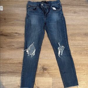 Distressed Blue Jeans